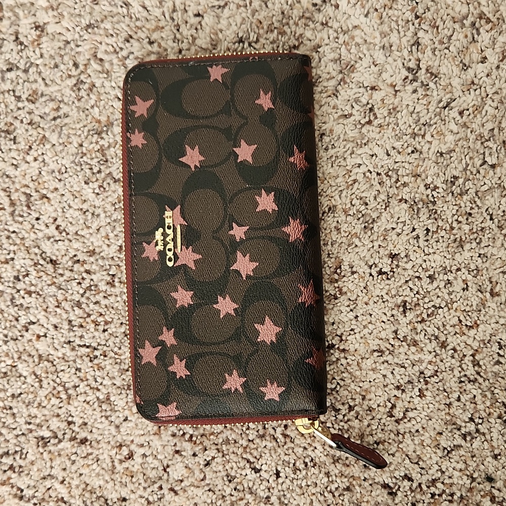 Brand New Authentic Coach Brown Monogram Wallet with pink disco stars.